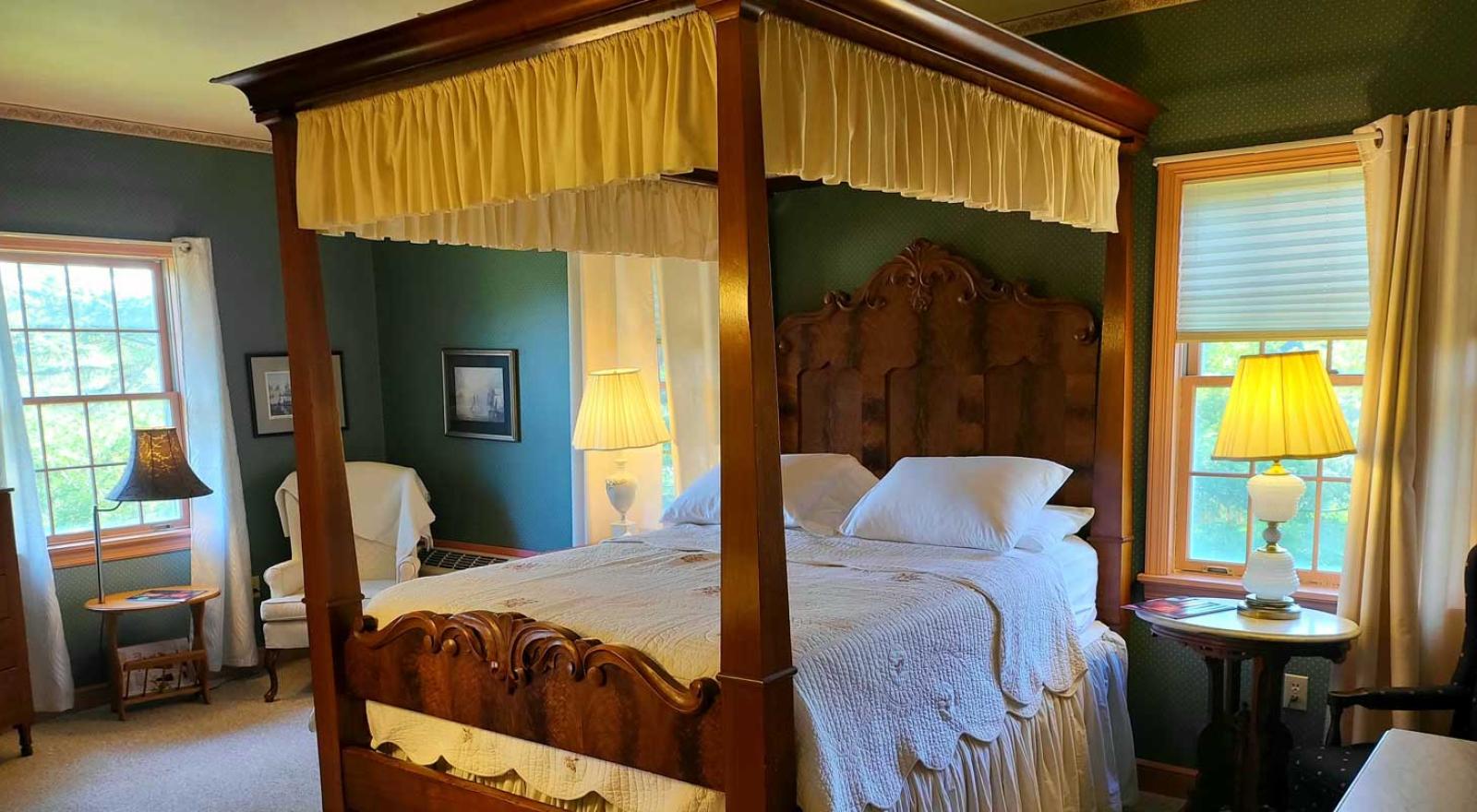1 Queen mid-19th century bed and furnishings. Includes private bath.